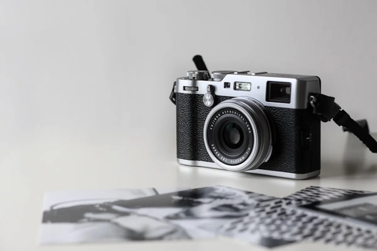 Camera and printed photographs representing image export formats